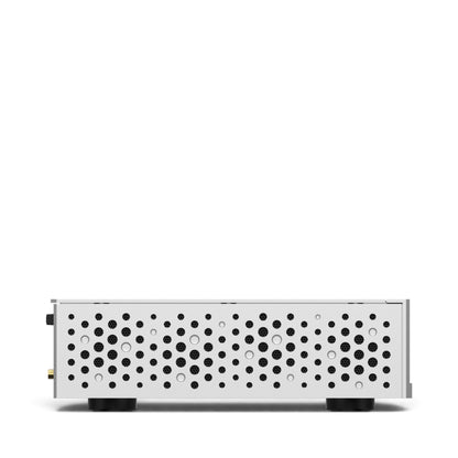 Matrix Audio MS-1c in Silber, linke Seitenansicht mit kreisförmigen Lüftungsöffnungen.